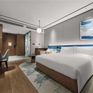 Postel nebo postele na pokoji v ubytování Hilton Garden Inn Beijing Yizhuang