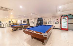 a large room with two pool tables in it at Green LP Hotel & Apartment in Vung Tau