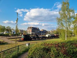 a train is parked on the tracks in a park at Bungalowpark Simpelveld - Delta 130 in Simpelveld