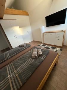 Posteľ alebo postele v izbe v ubytovaní Haus Kampl - Appartement Grundlsee