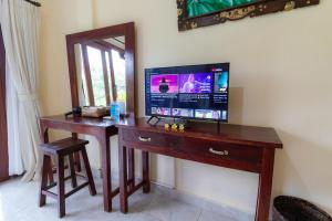 TV/Unterhaltungsangebot in der Unterkunft Doni House & Villas