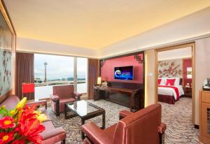 Televiisor ja/või meelelahutuskeskus majutusasutuses Hotel Riviera Macau