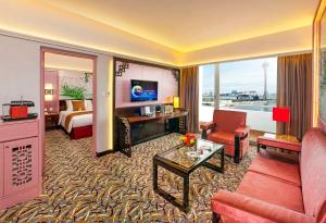 Televiisor ja/või meelelahutuskeskus majutusasutuses Hotel Riviera Macau