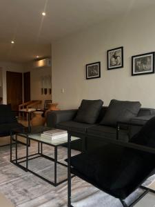 Χώρος καθιστικού στο Penthouse Elementos Cozumel Torre Fuego