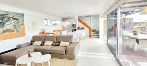 A seating area at Private villa with pool in Lajares
