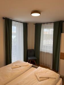 Posteľ alebo postele v izbe v ubytovaní Stubnerkogel Apartments
