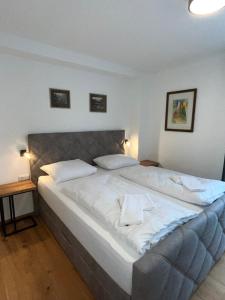 Posteľ alebo postele v izbe v ubytovaní Stubnerkogel Apartments