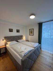 Posteľ alebo postele v izbe v ubytovaní Stubnerkogel Apartments