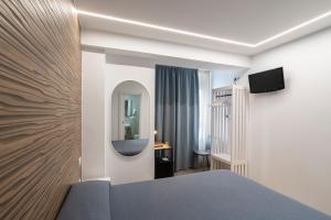 TV a/nebo společenská místnost v ubytování Hostal Pensimar