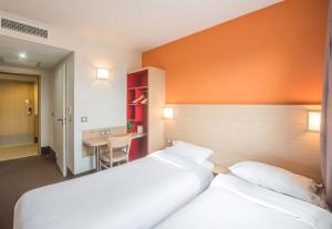 Postel nebo postele na pokoji v ubytování B&B HOTEL Gap