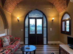Posezení v ubytování Sheherazade Hotel Nile Villa