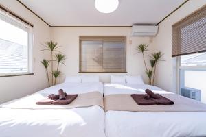 Letto o letti in una camera di Vivere