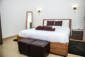 Ένα ή περισσότερα κρεβάτια σε δωμάτιο στο The Locale - in the Heart of Everything