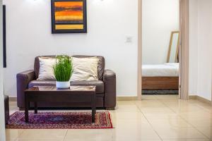 Ένα ή περισσότερα κρεβάτια σε δωμάτιο στο The Locale - in the Heart of Everything +6 φωτογραφίες