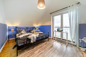 Postel nebo postele na pokoji v ubytování Ferienhaus Lieblingsplatz by Seeblick Ferien ORO, direkte Wasserlage,Sauna,Kamin