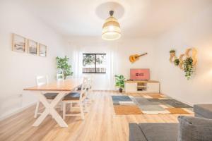 Khu vực ghế ngồi tại GuestReady - Urban adventure in Costa da Caparica