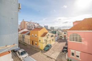 Cảnh Costa de Caparica hoặc tầm nhìn thành phố từ căn hộ