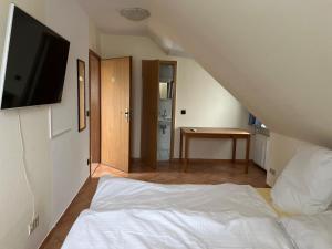 Postel nebo postele na pokoji v ubytování HS Hotel