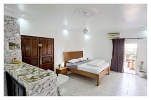 Gallery image of "Le BAOBAB" - CALME - CLIM - WIFI - White Butterfly Hotels in Dakar