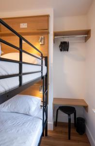 Postel nebo postele na pokoji v ubytování Éalú Lodge + 13 fotografií