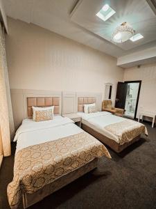 Postel nebo postele na pokoji v ubytování Safran Hotel