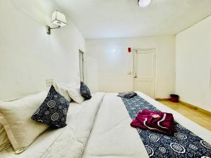 Letto o letti in una camera di Silver Land with mountain view - A River side property