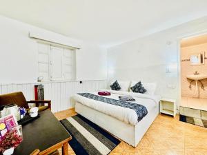 Letto o letti in una camera di Silver Land with mountain view - A River side property