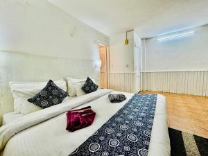 Letto o letti in una camera di Silver Land with mountain view - A River side property
