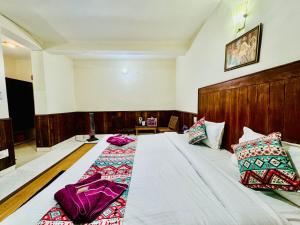 Letto o letti in una camera di Silver Land with mountain view - A River side property