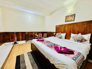 Letto o letti in una camera di Silver Land with mountain view - A River side property