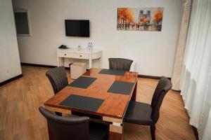 TV a/nebo společenská místnost v ubytování Safran Hotel + 37 fotografií