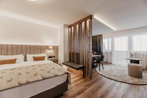 Postel nebo postele na pokoji v ubytování Freina Mountain Lifestyle Hotel
