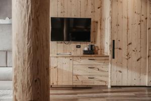 TV a/nebo společenská místnost v ubytování Freina Mountain Lifestyle Hotel