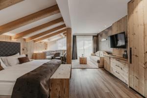 Postel nebo postele na pokoji v ubytování Freina Mountain Lifestyle Hotel