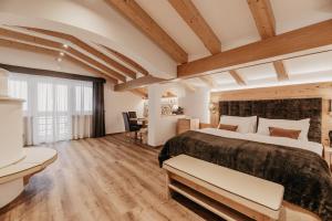 Postel nebo postele na pokoji v ubytování Freina Mountain Lifestyle Hotel