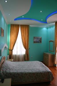 Katil atau katil-katil dalam bilik di Carpediem Hotel Restaurant