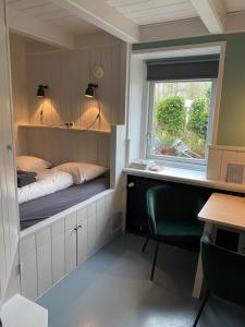 Postel nebo postele na pokoji v ubytování Hotel Marenland Winsum + 4 fotografie