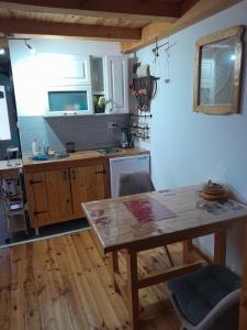Η κουζίνα ή μικρή κουζίνα στο Apartman Čivović
