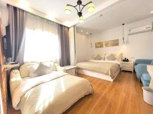 Lijiang Old Town Meiliju View Inn客房内的一张或多张床位