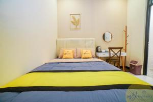 Postel nebo postele na pokoji v ubytování Riad de Alba Syariah by MHM