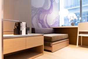 Postel nebo postele na pokoji v ubytování Studio M Hotel + 37 fotografií