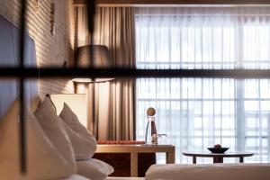 Postel nebo postele na pokoji v ubytování Adler Spa Resort Balance