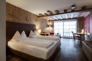 Postel nebo postele na pokoji v ubytování Adler Spa Resort Balance