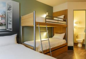 Postel nebo postele na pokoji v ubytování B&B HOTEL Metz Semécourt