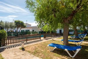 A garden outside Bungalows ses malves
