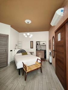 Postel nebo postele na pokoji v ubytování Aparthotel Dei Mercanti
