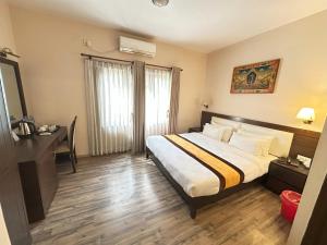 Voodi või voodid majutusasutuse Hotel Shuman, Boudha toas