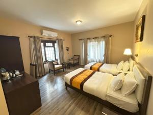 Voodi või voodid majutusasutuse Hotel Shuman, Boudha toas