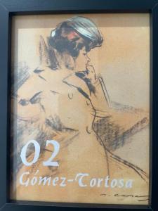 a picture of a woman in a painting at Gómez-Tortosa Apartamento in Novelda