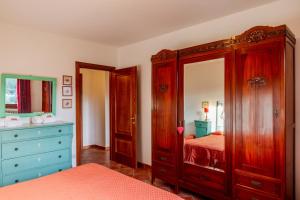 Postel nebo postele na pokoji v ubytování Agriturismo Bio Fattoria Casetta